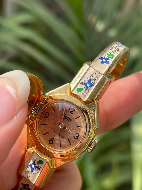 Forget-me-not Vintage peekaboo bangle watch