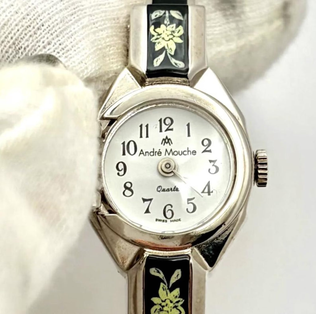 Daisy Vintage peekaboo bangle watch