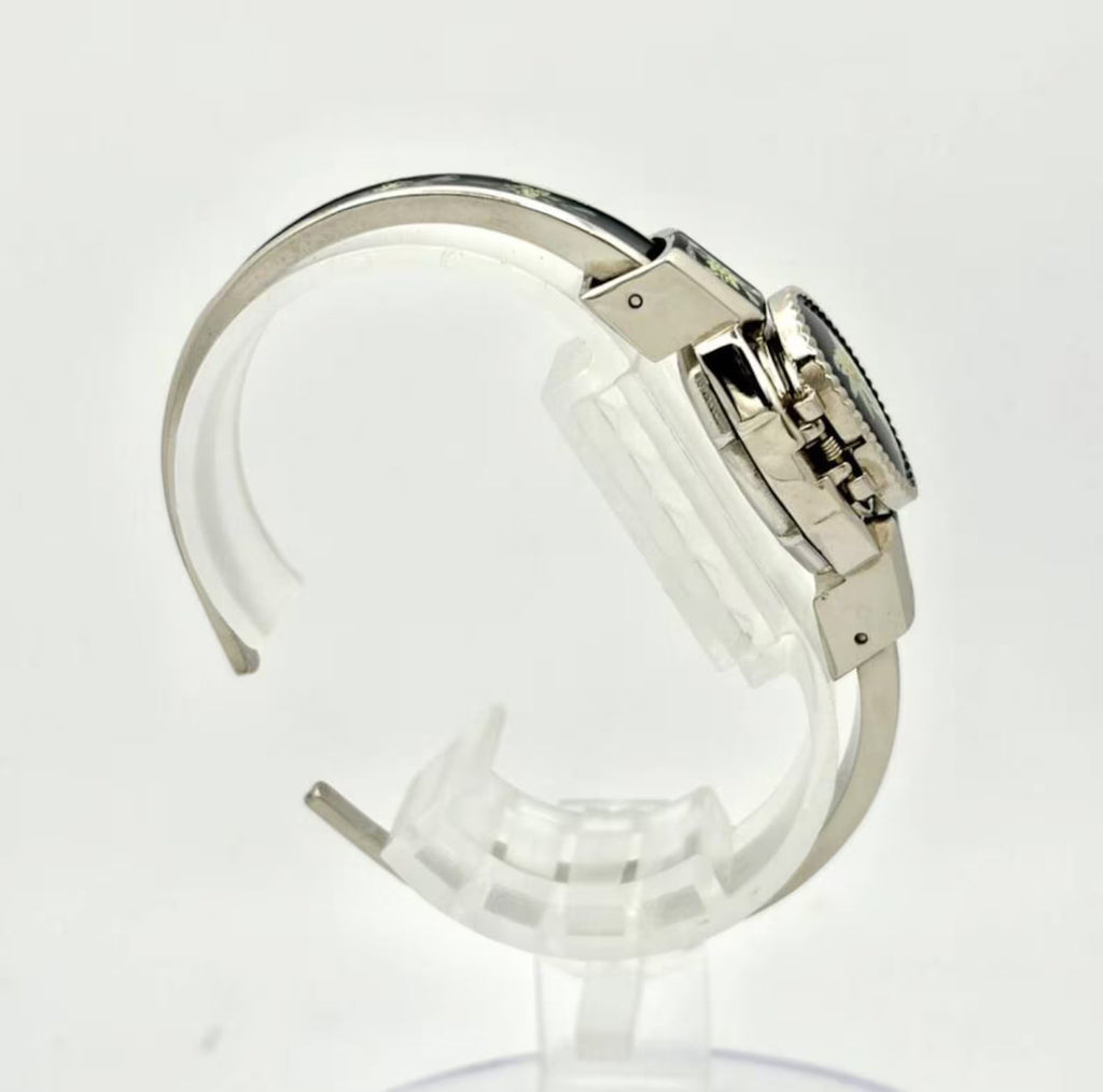 Daisy Vintage peekaboo bangle watch